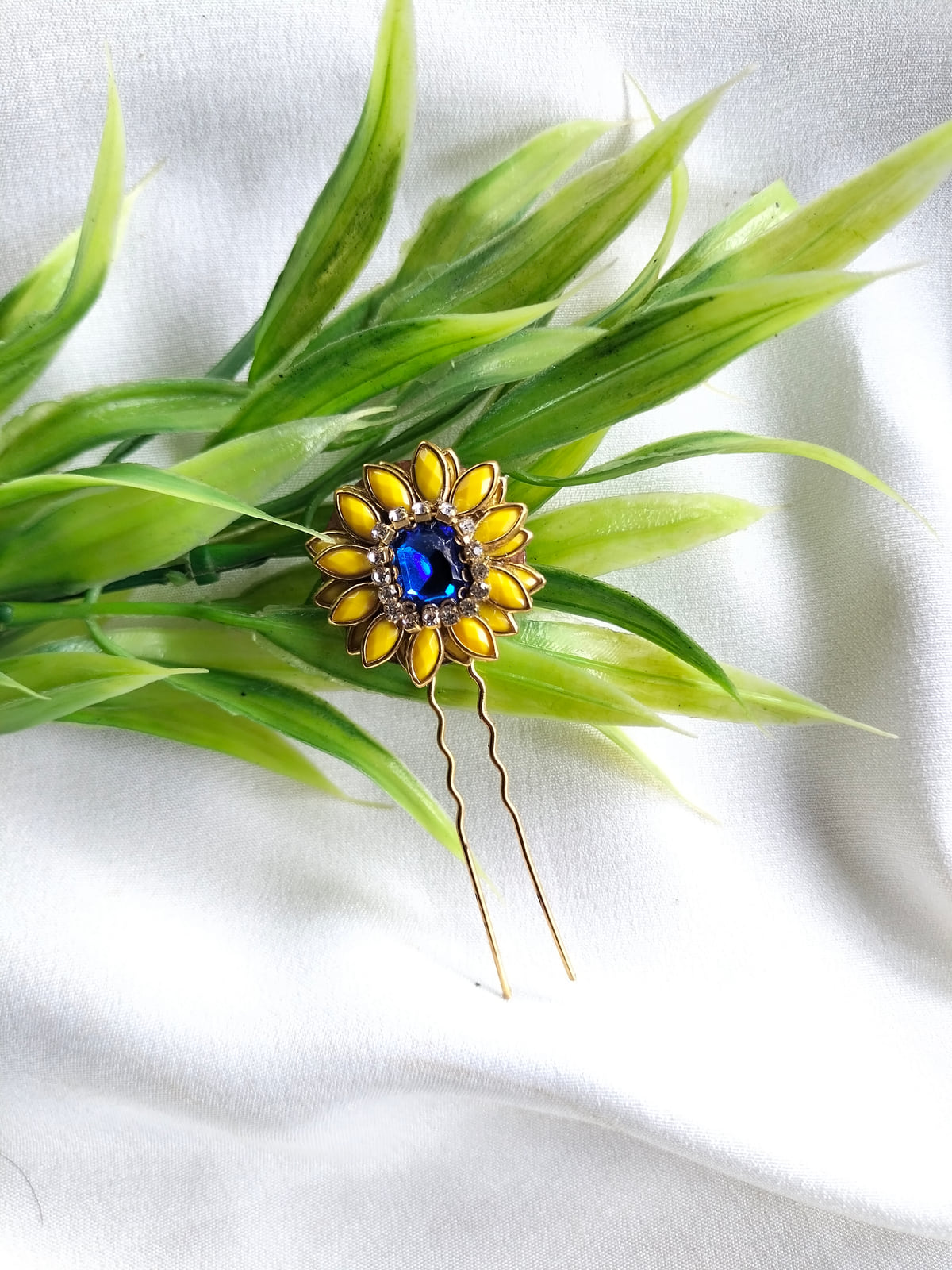 Coin and kundan flower bangles styled together